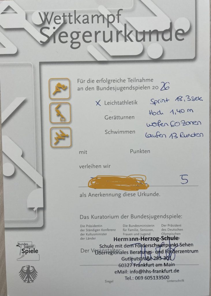 Siegerurkunde der Bundesjugendspiele mit Punkten und Schulstempel